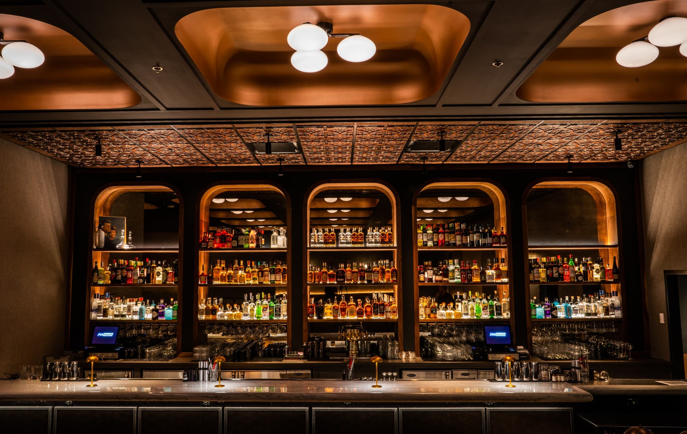 Bar at Heirloom, Reston — backbar and arched display